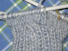 Close-up of first cable on new mittens