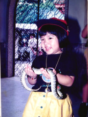 Little Sister Carrying A Snake.