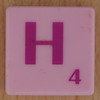 Scrabble pink tile letter H