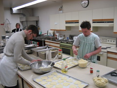 Adding different cheeses to the tarts
