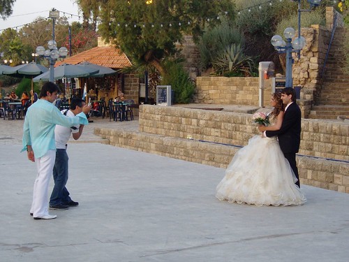 A newly wed posing for pictures in Jaffa city
