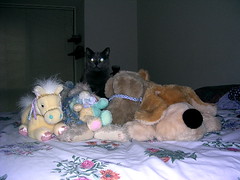 Artemis with a mountain of stuffed animals