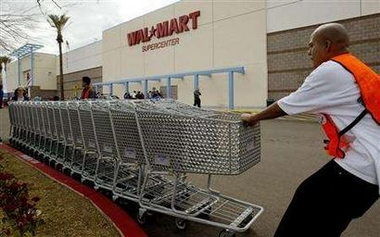 Moving shopping carts at a Wal-Mart Supercenter