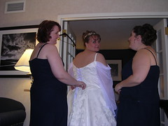 The girls cinching up my dress