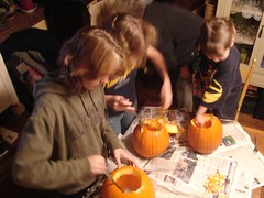 women pumpkin carving time