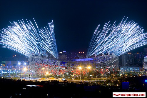 Fireworks explode over the Beijing National Stadium - Bird’s Nest for the opening ceremony of the Beijing 2008 Olympic Games