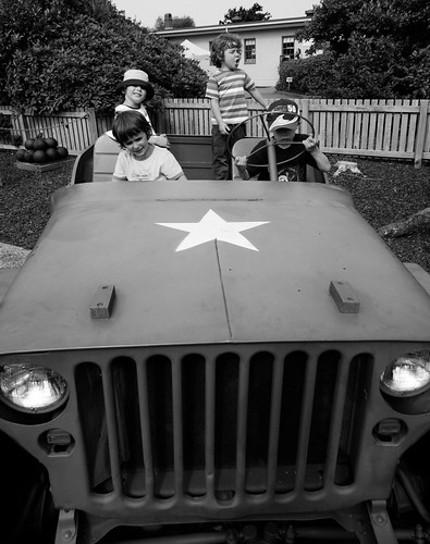 Four boys in a Jeep