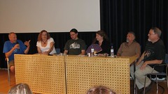Markku Soikkeli, Cheryl Morgan, Ben Roimola, Farah Mendlesohn, Mike Harrison, and Edward James behind a table discussing