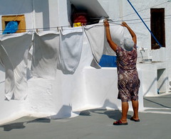 old woman drying towels