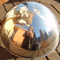 Myself in a metal globe ashtray