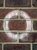 White Capital \"O\" Stenciled on a Brick Wall (Silver Spring, MD)