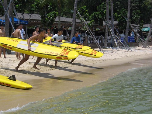Surf Board Race: Paddling on a lifesaving surfboard around a circuit