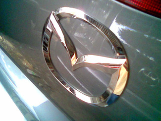 Silvery Mazda logo