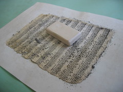 Sheet of music being cleaned