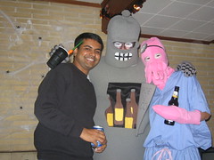 With Bender and Doctor Zoidberg, and ahem! some beers.