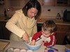 Mom and Jake making cupcakes