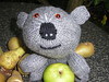 Wombat in apples closeup