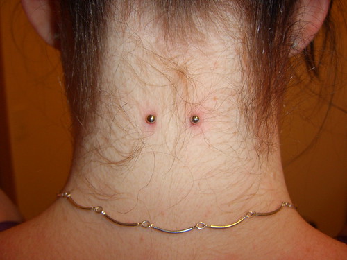 While she was there, she decided to get her nape pierced.