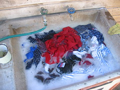 Sink filled with laundry