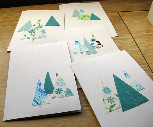 Fabric, stitching, and paper Christmas cards