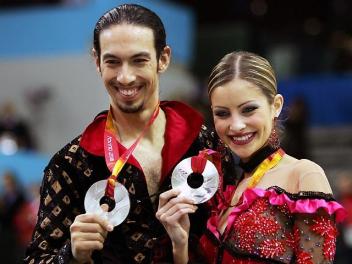 ben agosto and tanith belbin winning the silver medal for ice dancing in torino