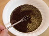 Mixing coffee and Yerba Mate in bowl.