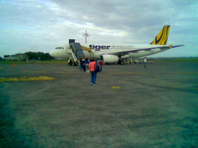 Boarding the Tiger Airways plane