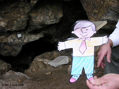 Flat Bobby in front of one of the cave openings