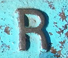 R from water meter cover