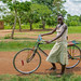 a girl and her bike near Busia