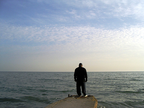 Chris looking out at Lake Ontario from The Beach Toronto