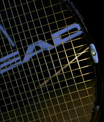 tiny hole through the racket