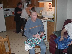 Chris opening a present