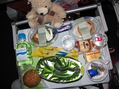 Tiny Albert tries the fare in Super Squished Cattle Class on Virgin Atlantic from Sydney.