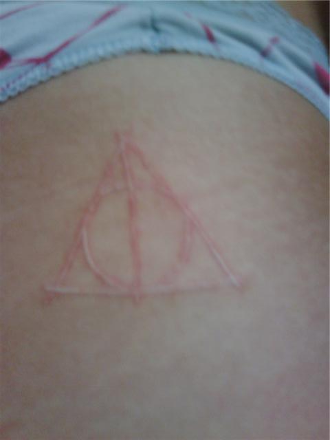 harry potter and deathly hallows symbol. deathly hallows white tattoo