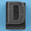 metal type letter D