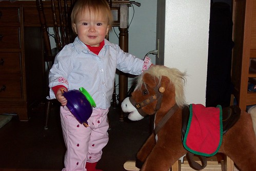 Celeste Feeds Her Rockin' Pony