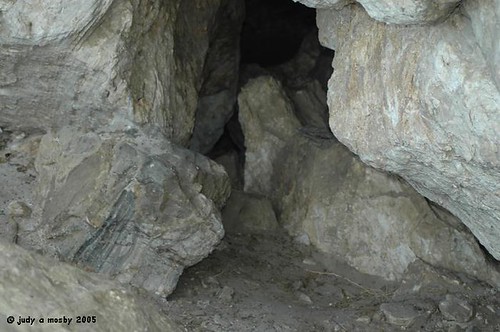 Peering in one of the openings at Lovelock Cave