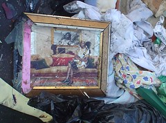 a broken photo frame left behind the refugees.