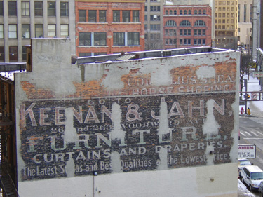 These ghost signs were painted over before the Super Bowl