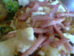 Closeup of goats cheese and smoked bacon bruschetta