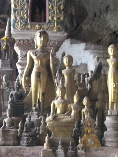 Buddha statues fill the Pak Ou caves