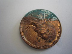 Copper oxidizing off a penny