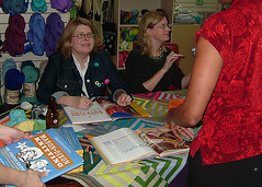Ann and Kay sign books