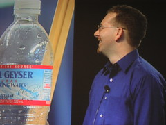 Live AX auction: auctioneer and water bottle