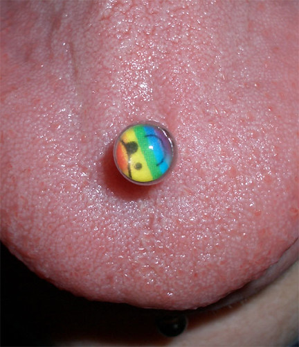 small smiley piercing. my tongue pierced and kept