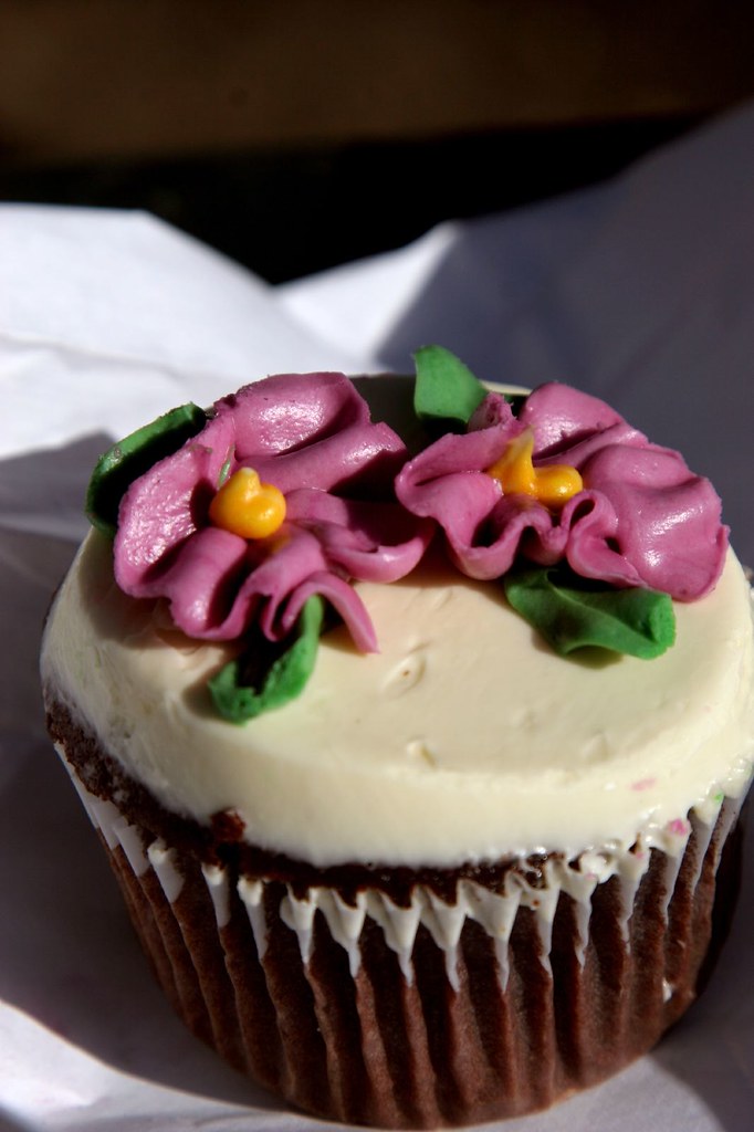 39th St Cupcake Cafe Bakery Chocolate with White Frosting and Flowers Cupcake