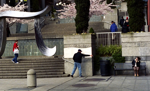 Four Figures,shot with a Nikon F, 50mm, f1.8, iso color neg film, in Seattle, WA ©2006 Jim Scolman