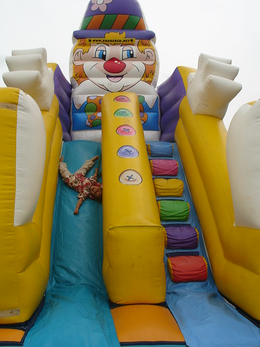 Upside down on the bouncy slide