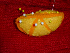 Orange wedge pincushion